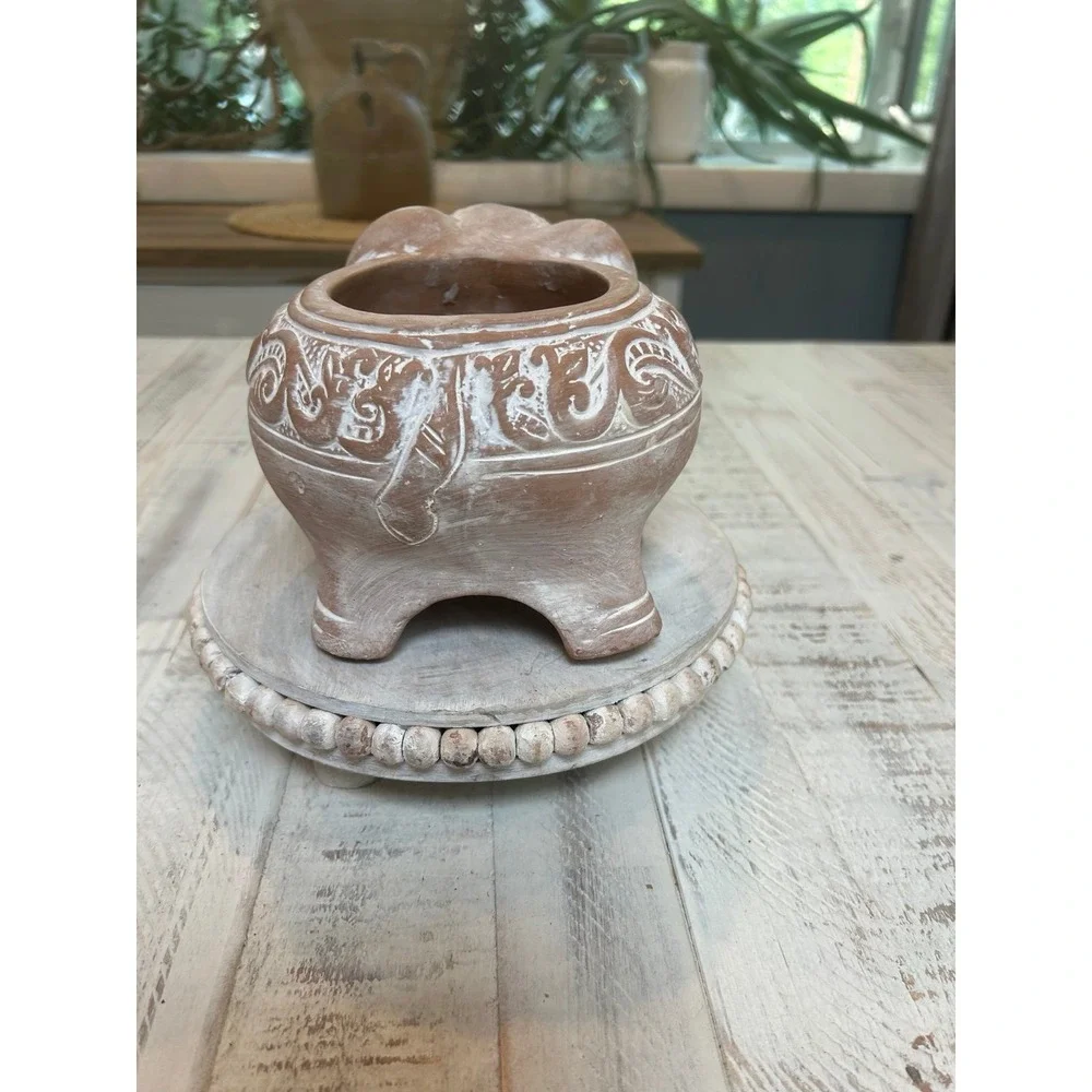 Terracotta white washed elephant‎ planter.